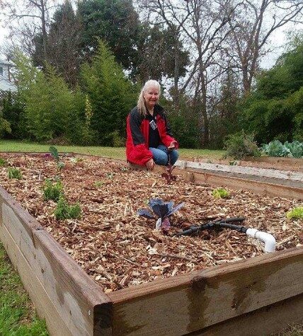 Terri Bigsby working at the Community Gardens