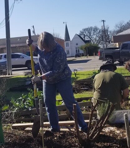 Gail Smith and Mark at work in the community gardens