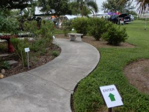 Spring 2019 plant sale - concrete path around butterfly garden