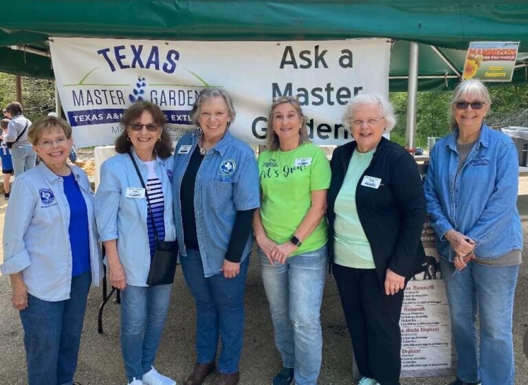 Members of the McLennan County Master Gardeners host a booth